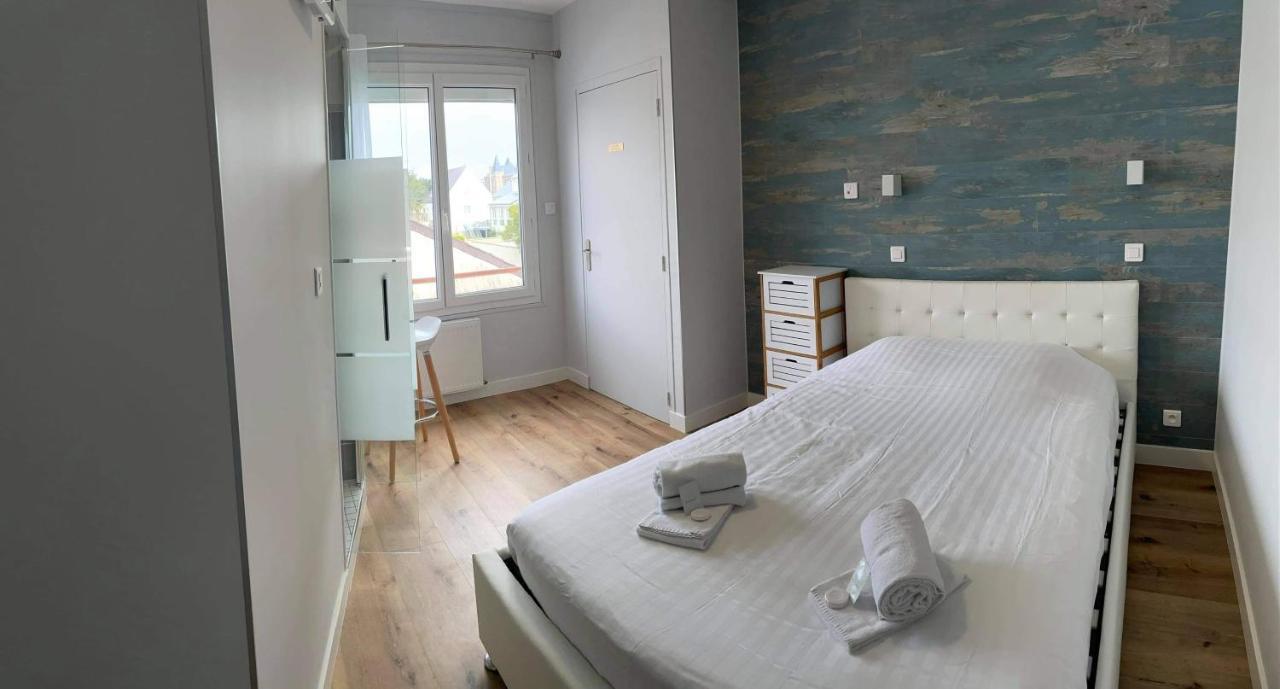 Hotel De La Plage Quineville Bagian luar foto