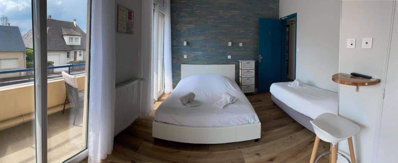 Hotel De La Plage Quineville Bagian luar foto